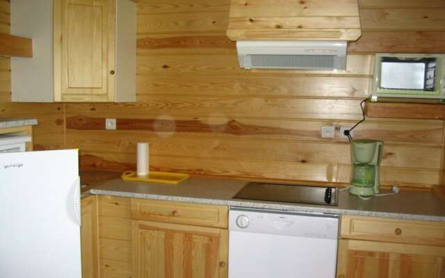 Wooden Chalet With a Washer, Near a Lake