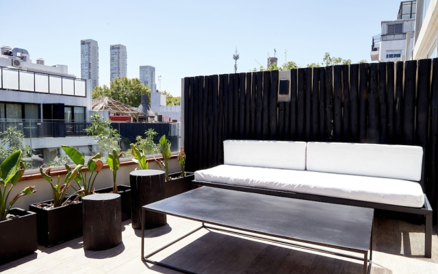 Unique triplex with rooftop private use