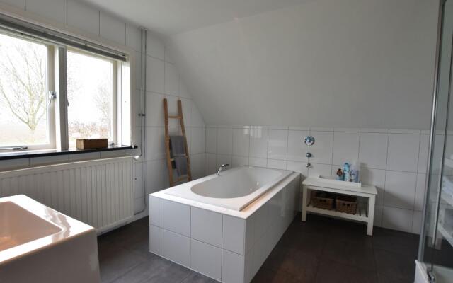 Spacious Farmhouse in IJzendijke with Garden