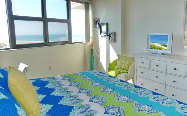 Beachfront Condo With Views of Beach and Spacious Pool