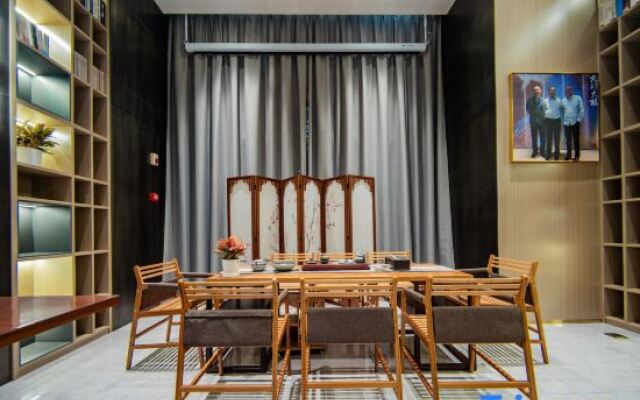 Wutong Apartments Hotel