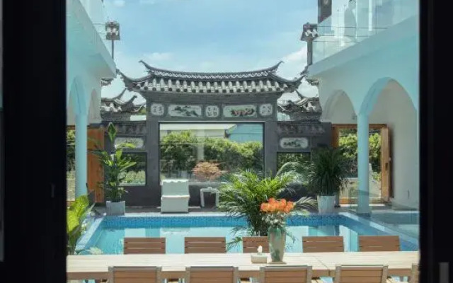 Dali Qihai Tingfeng Inn (Zhangjia Garden Branch)
