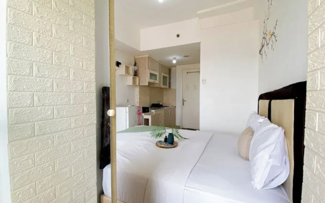 Homey And Cozy Living Studio At Poris 88 Apartment