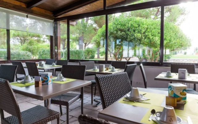 Nicolaus Club Alimini Smile