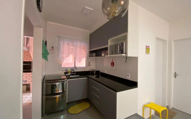 Casa em Bertioga condomínio 250 metros da praia