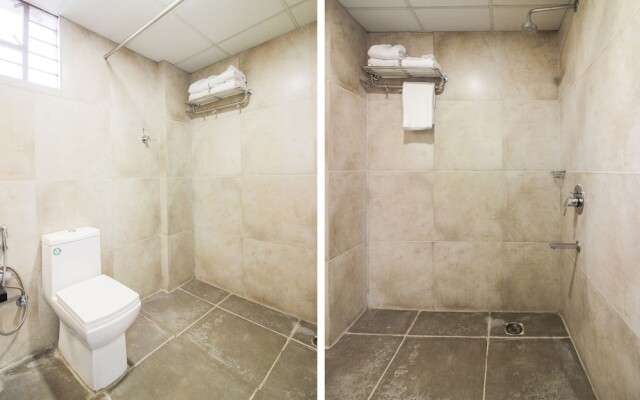 Capital O 15964 NI Ambaari Suites