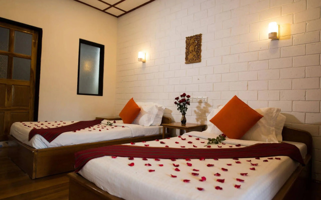 Teak Wood Hotel