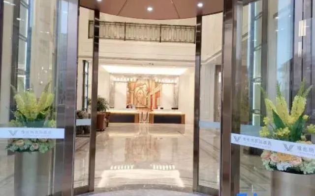 Vienna International Hotel (Yiyang Taojiang Dongfang New Town Branch)