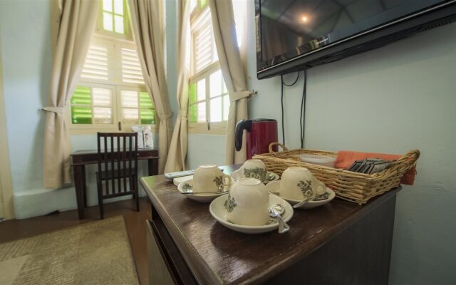 PalanquInn Heritage Suites