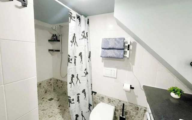 Двухуровневая квартира в стиле Лофт на Нагорной