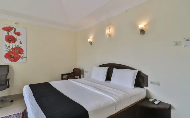 Holiday Palms by OYO Rooms