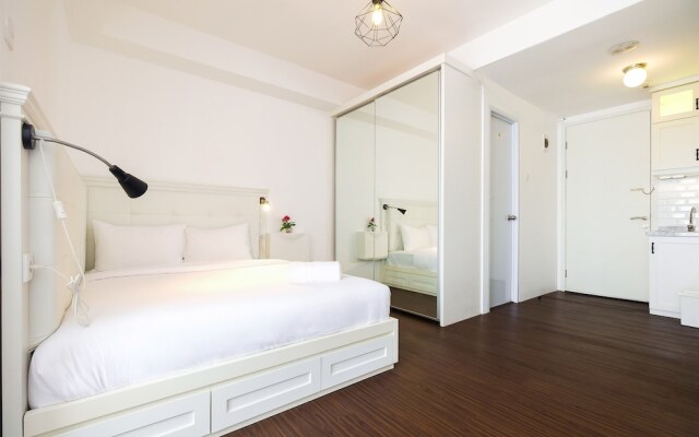 Minimalist Studio at Bassura City Apartment By Travelio
