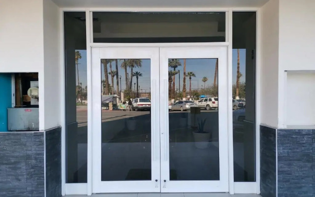 Capital O Baja Place Inn