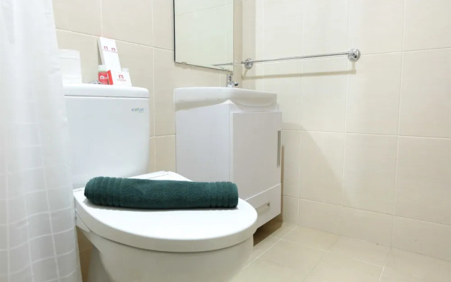 Comfy Studio Room @ Oasis Apartment By Travelio