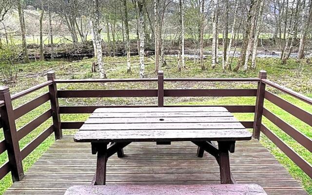 Riverside log cabins
