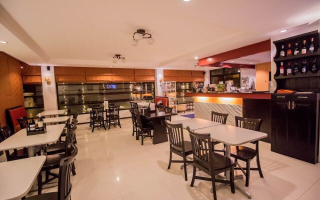 The Red Palm Suites and Restaurant