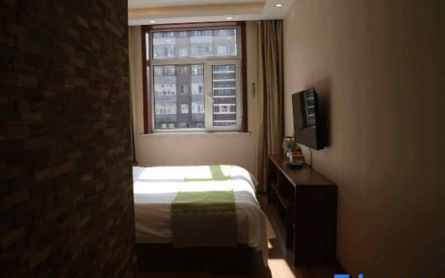 Xinyue Hotel (Mudanjianghuochebeizhanxinhualudian)
