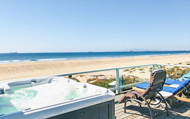 Spectacular Beachfront House by RedAwning