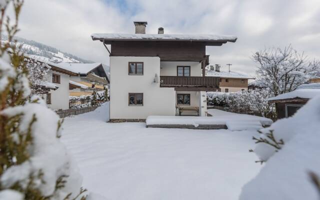 Quaint Chalet in Kirchberg with Terrace, Garden, Ski Storage