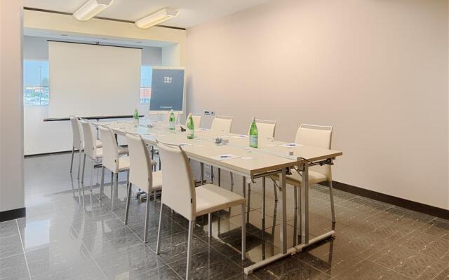 Отель NH Venezia Laguna Palace