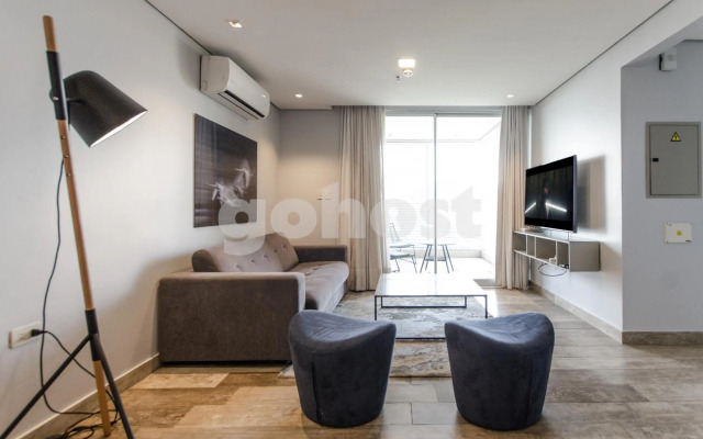 Encantador Apartamento en Villa Morra 1D004