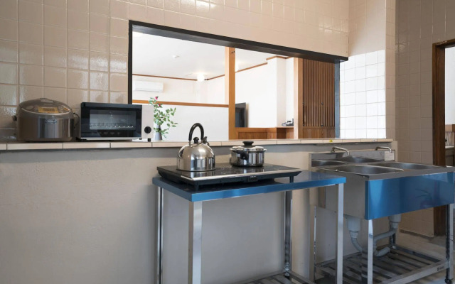 Tsubaki House