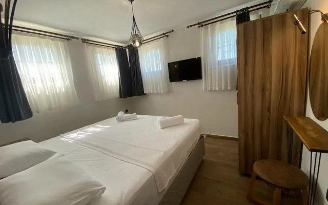 Tinos Otel & Bağ Evi (+12 Yaş)