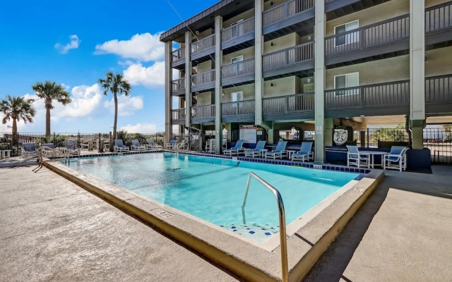 Newly Remodeled Oceanfront Condo with Salt Water Pool and Private Walkway to Beach by RedAwning