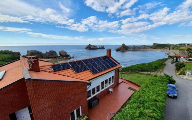 House with 5 bedrooms in Cantabria with wonderful sea view enclosed garden and WiFi 50 m from the beach