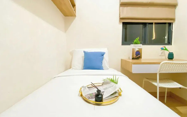 Relaxing And Strategic 2Br At Sky House Bsd Apartment