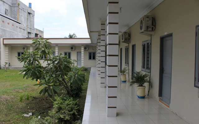 Penginapan Transit Tomato