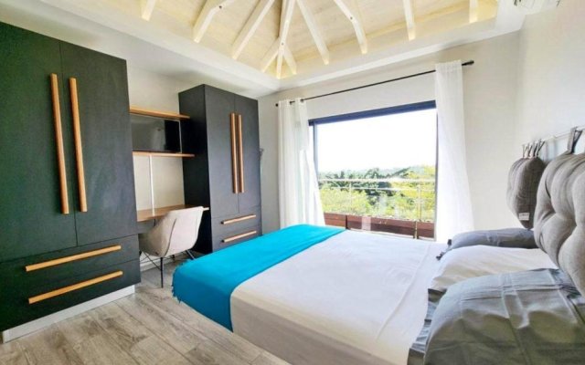 Villa de 3 chambres avec vue sur la mer piscine privee et jardin clos a Goyave a 2 km de la plage