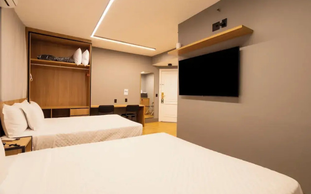 You Stay at Vila Olimpia - The World