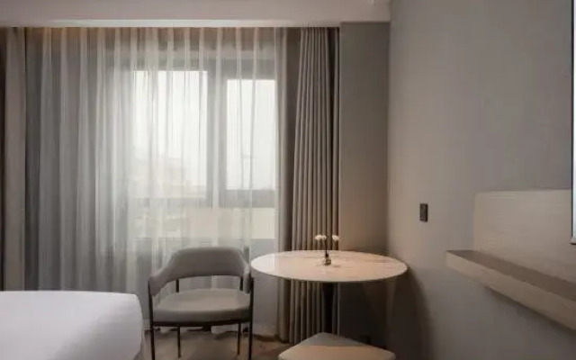 Berman Hotel (Zhanjiang Wuchuan Jiefang Middle Road Gangfeng Plaza)