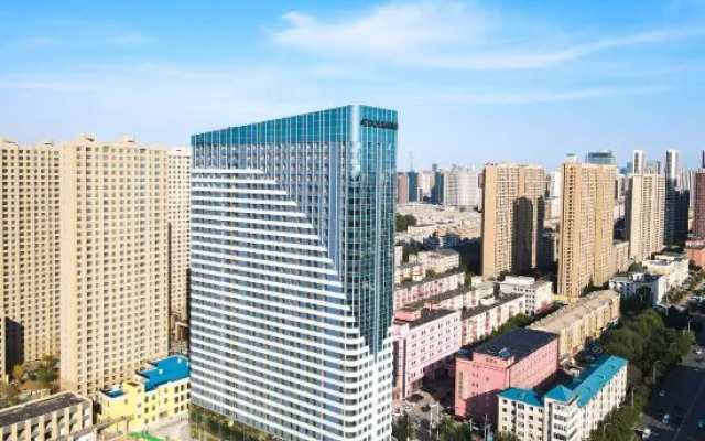 Shenyang Tiexi Square Baogong Street Light Residence Hotel