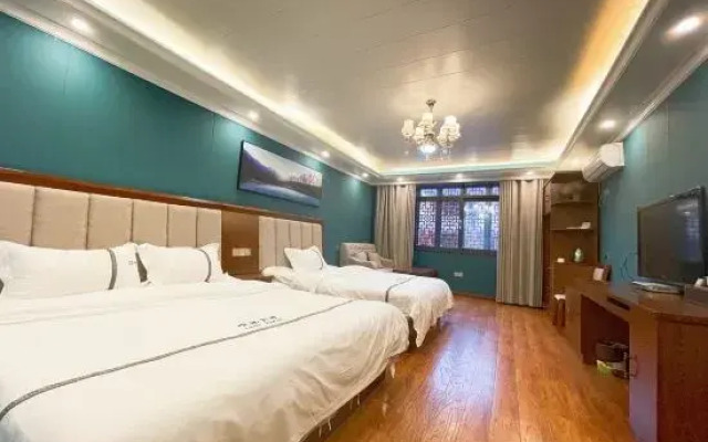 Shunxin Holiday Hotel (Luding Hailuogou Branch)