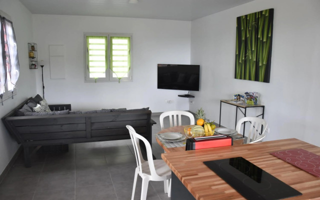 Haut de villa dans son écrin de verdure