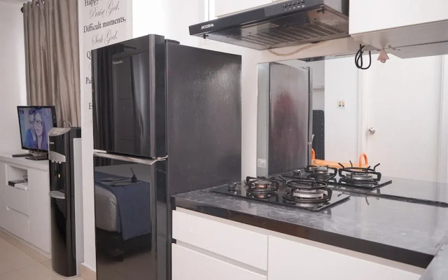 Comfortable and Warm Studio at Poris 88 Apartment