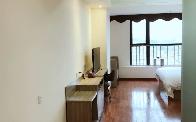 Xingyue Apartment Luogang Wanda