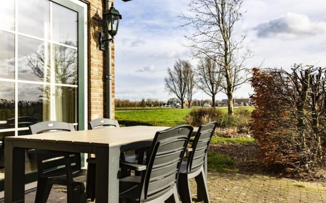Pretty Farmhouse in Genderen with Terrace and Garden