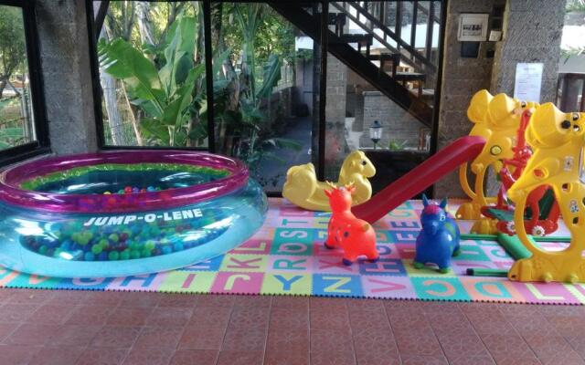 Отель Melasti Kuta Beach Hotel and Spa