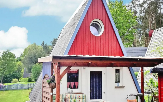Roof House Near Dummer See With Rowing Boat