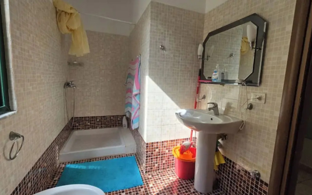 Tirent Apartment - Cozy Bedrooms Stay by Golem Beach.