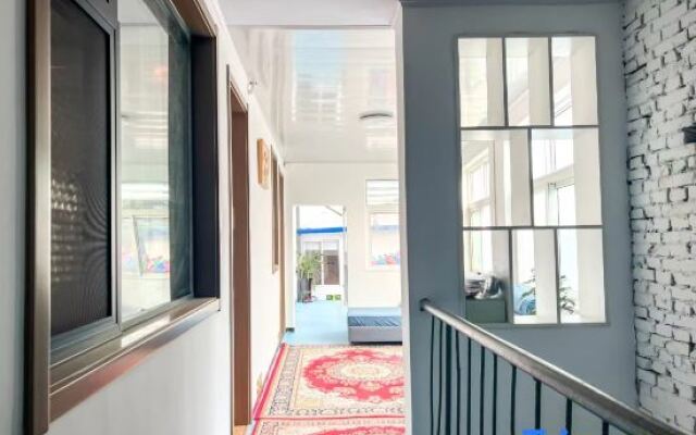 Luoyang Qingqing Yuanshe Homestay (Lijingmen Cross Street Store)