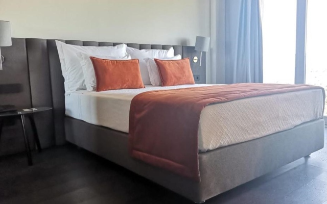 Отель Versatile