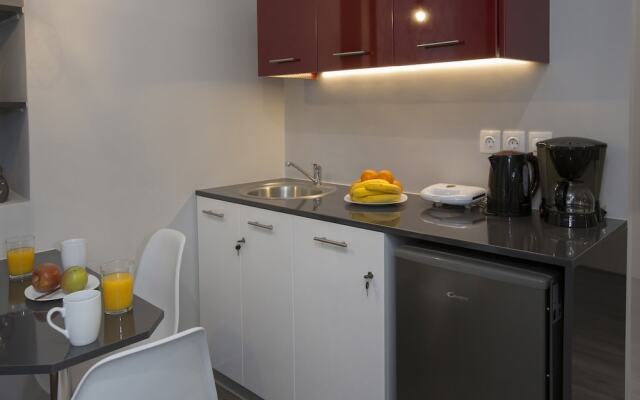 Homelike Studios in the Heart of the City by GHH