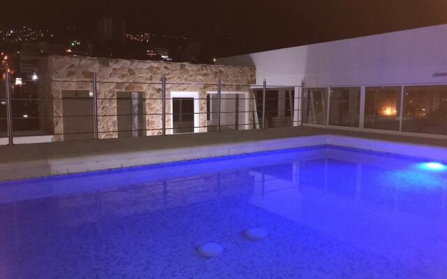 Apartasuites La Flora