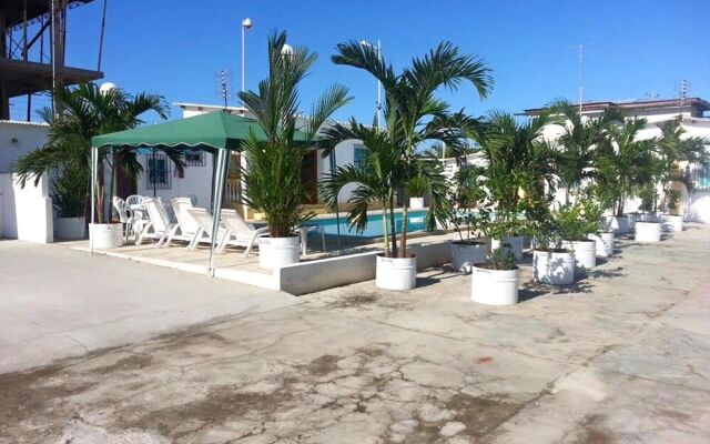 Hostal Palmeras Playa Milina