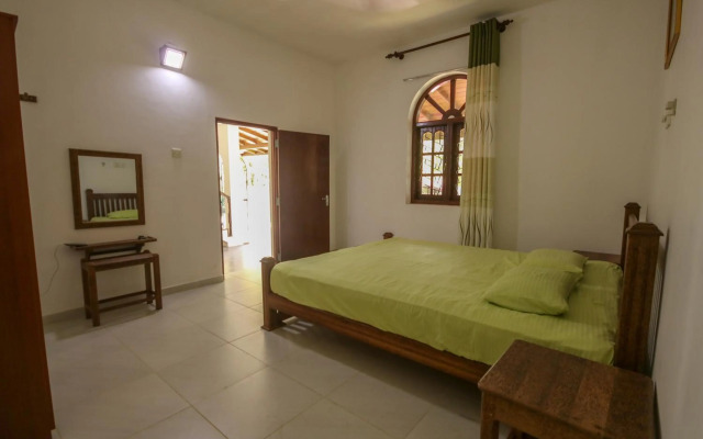 Green White Deluxe Room
