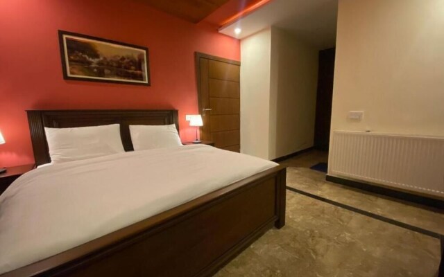 AK Hotel & Suites
